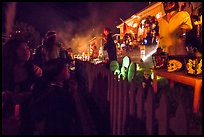 Children look at house with Halloween decorations. Petaluma, California, USA ( color)