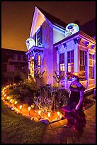 Woman in Halloween costume and decorated house. Petaluma, California, USA ( color)