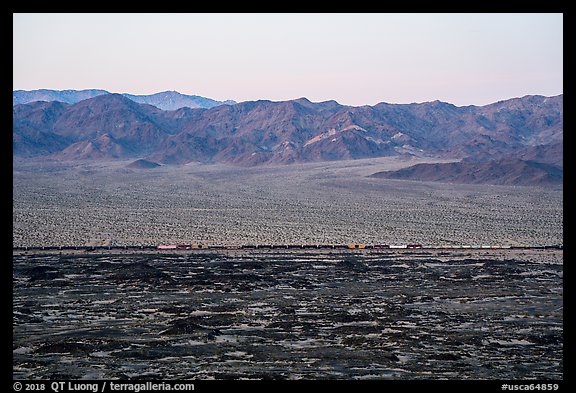 Freigh train and desert mountains. Mojave Trails National Monument, California, USA (color)