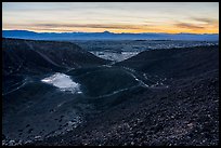 Interior of Amboy Crater with breach in the cinder cone rim at sunset. Mojave Trails National Monument, California, USA ( color)