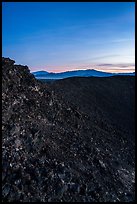 Interior slopes of Amboy Crater and mountains at dusk. Mojave Trails National Monument, California, USA ( color)