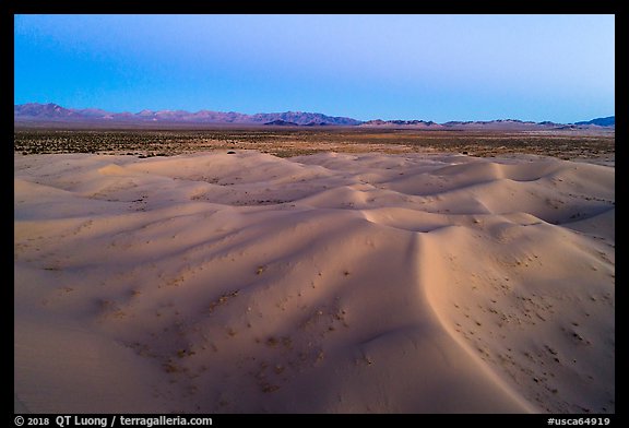 Aerial view of sand dunes and mountains at dusk, Cadiz Dunes. Mojave Trails National Monument, California, USA (color)