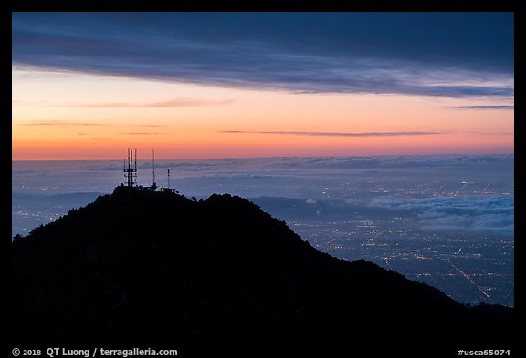Mount Wilson antennas and Los Angeles with fog at sunrise. San Gabriel Mountains National Monument, California, USA (color)