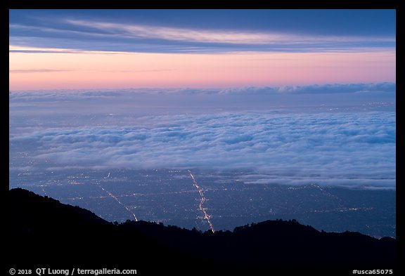 Low clouds above Los Angeles at sunrise from Mount Wilson. Los Angeles, California, USA (color)