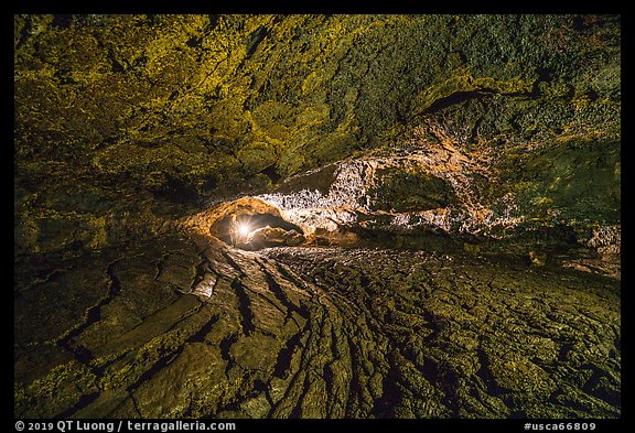 Caver in Golden Dome Cave. Lava Beds National Monument, California, USA