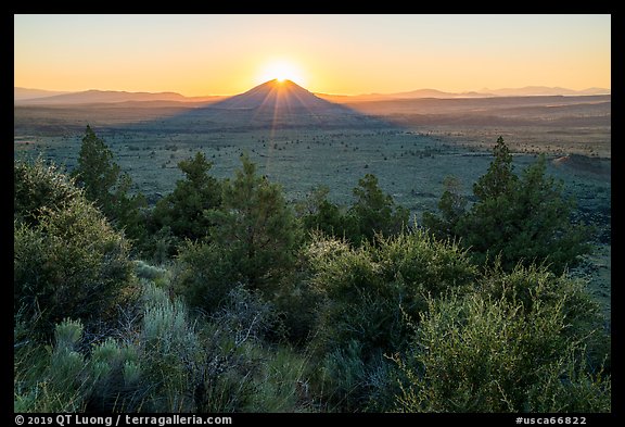 Whitney Butte with sun setting. Lava Beds National Monument, California, USA (color)