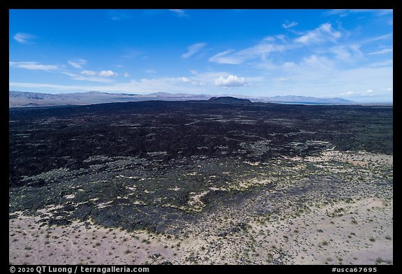 Aerial view of Lavic Lake volcanic field with distant Pisgah Crater. Mojave Trails National Monument, California, USA (color)