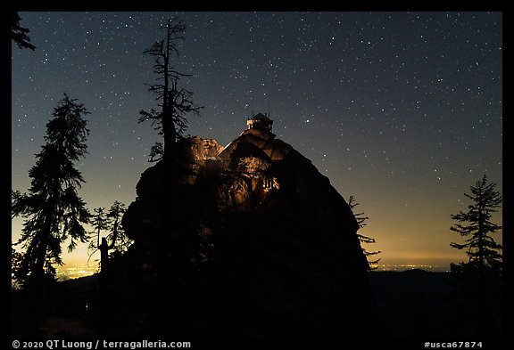 Buck Rock and Central Valley lights at night. Giant Sequoia National Monument, Sequoia National Forest, California, USA (color)
