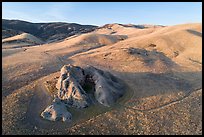 Aerial view of U-shaped rock outcrop named Painted Rock. Carrizo Plain National Monument, California, USA ( color)