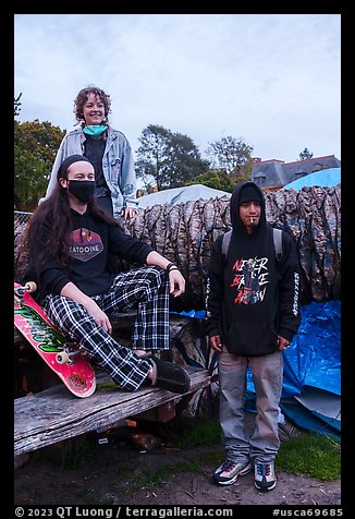 Volunteers posing with resident at Peoples Park. Berkeley, California, USA (color)