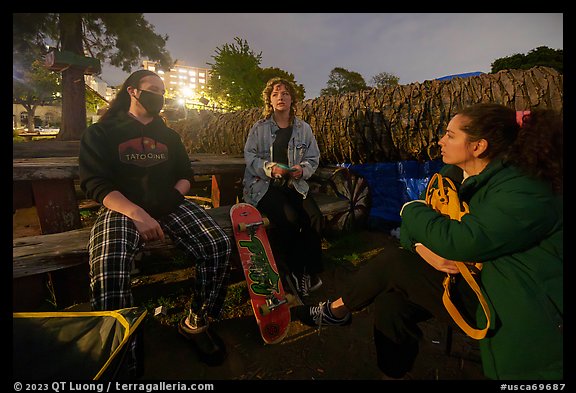 Conversation at night, Peoples Park. Berkeley, California, USA (color)