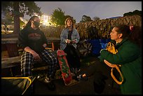 Conversation at night, Peoples Park. Berkeley, California, USA ( color)