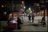 Men playing chess on Telegraph Avenue at night. Berkeley, California, USA ( color)