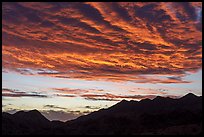Colorful clouds and Chuckwalla Mountains at sunrise. Chuckwalla National Monument, California, USA ( color)