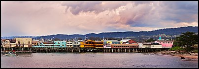 Fishermans Wharf colorful buildings at sunset. Monterey, California, USA (Panoramic color)