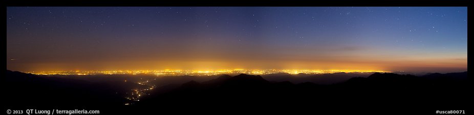 Central Valley lights at dusk seen from Morro Rock. California, USA (color)