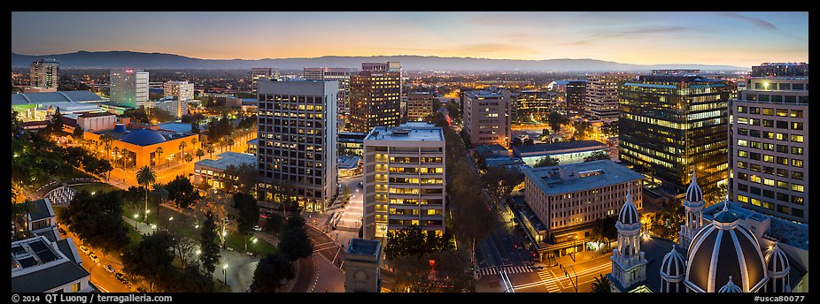 Downtown San Jose skyline and Santa Cruz Mountains at dusk. San Jose, California, USA (color)