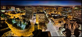 Downtown San Jose skyline and lights at night. San Jose, California, USA