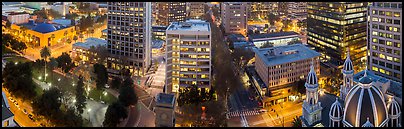 Downtown San Jose buildings after sunset. San Jose, California, USA (Panoramic color)