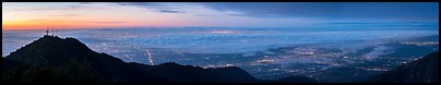 Foggy Los Angeles Basin from Mount Wilson at sunrise. Los Angeles, California, USA (Panoramic color)