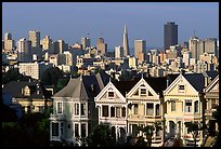 Victorians at Alamo Square and skyline, afternoon. San Francisco, California, USA (color)