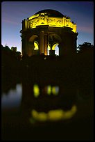 Rotunda of the Palace of Fine arts reflected in lagoon at  night. San Francisco, California, USA (color)