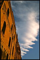 Old brick building and serrated cloud, sunset, Fisherman's Wharf. San Francisco, California, USA ( color)