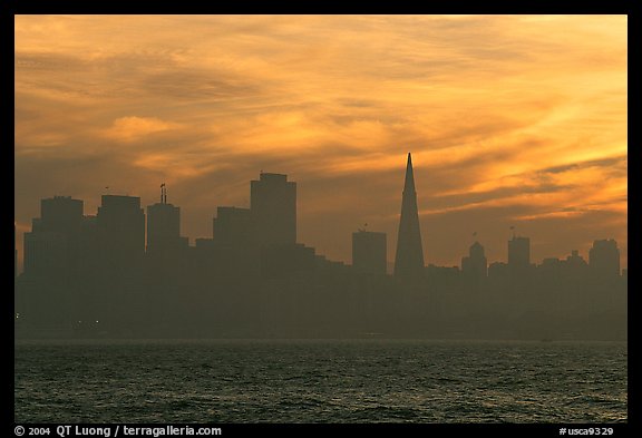 City skyline with sunset clouds seen from Treasure Island. San Francisco, California, USA (color)