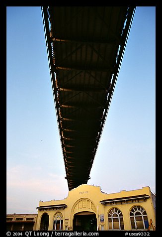 Bay Bridge dwarfs Pier 26 building. San Francisco, California, USA (color)