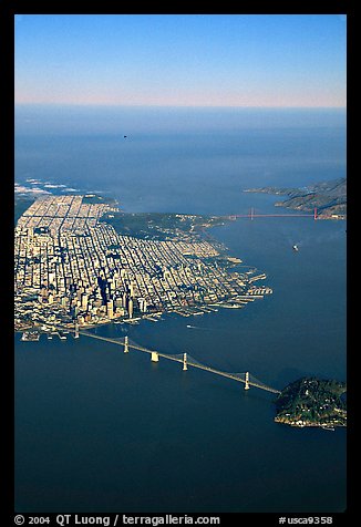 Aerial view of the Bay Bridge, the city, and  the Golden Gate Bridge. San Francisco, California, USA