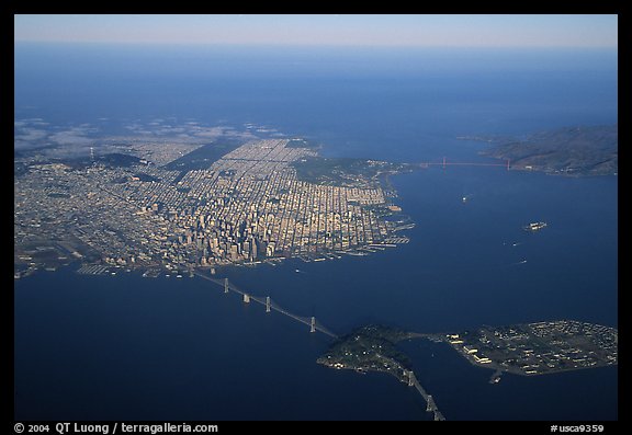 Aerial view of the Bay Bridge, the city, and  the Golden Gate Bridge. San Francisco, California, USA