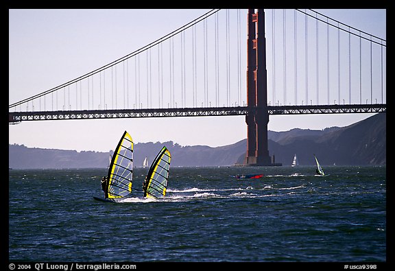 Windsurfers at Crissy Field, with the Golden Gate Bridge behind. San Francisco, California, USA