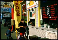 Hispanic women at a taco shop. Redwood City,  California, USA