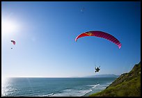 Paragliders soaring above the Ocean, the Dumps, Pacifica. San Mateo County, California, USA