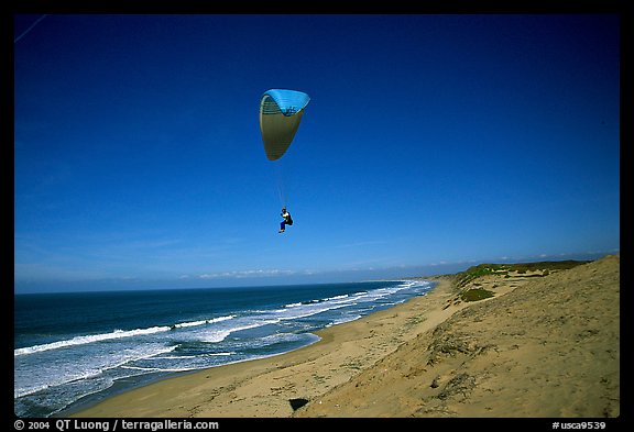 Paragliders soaring above Marina sand dunes. California, USA (color)
