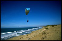 Paragliders soaring above Marina sand dunes. California, USA