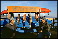 Fishermen with caught fish, Capitola. Capitola, California, USA (color)