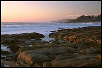 Rock ledges at  sunset,  Carmel River State Beach. Carmel-by-the-Sea, California, USA