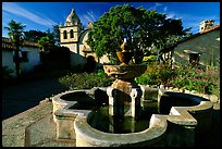 Fountain and chapel, Carmel Mission. Carmel-by-the-Sea, California, USA (color)