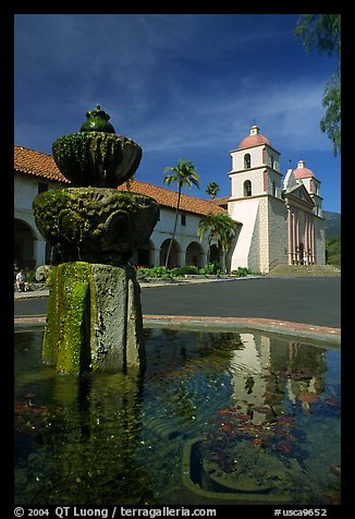 Fountain and Mission Santa Babara, mid-day. Santa Barbara, California, USA (color)