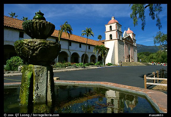 Fountain and Mission Santa Babara, mid-day. Santa Barbara, California, USA (color)