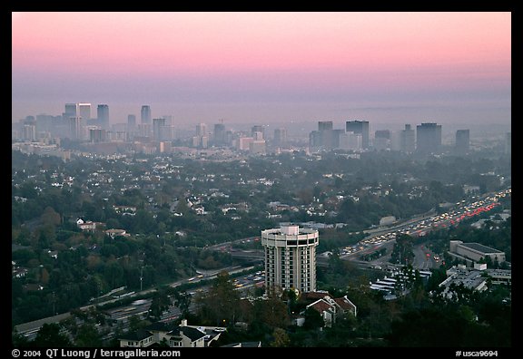 Los Angeles skyline seen from Brentwood at dusk. Los Angeles, California, USA (color)