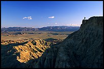 Visitor surveying panorama at Font Point. Anza Borrego Desert State Park, California, USA (color)