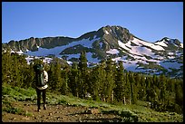 Backpacker  on trail towards Round Top. Mokelumne Wilderness, Eldorado National Forest, California, USA (color)