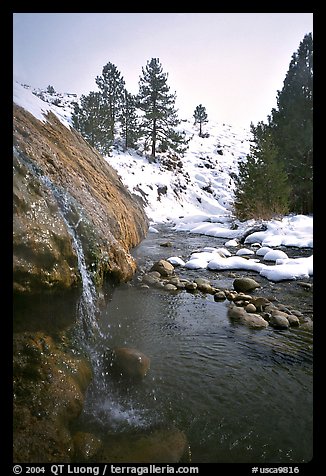 Water floweing over travertine, Buckeye Hot Springs in winter. California, USA