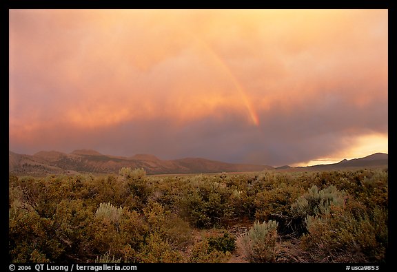 Rainbow and storm over Mono Basin, evening. Mono Lake, California, USA