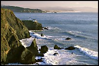 Cliffs and Point Bonita Lighthouse, late afternoon. California, USA