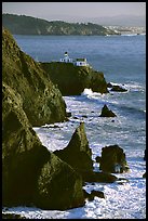 Cliffs and Point Bonita Lighthouse, late afternoon. California, USA