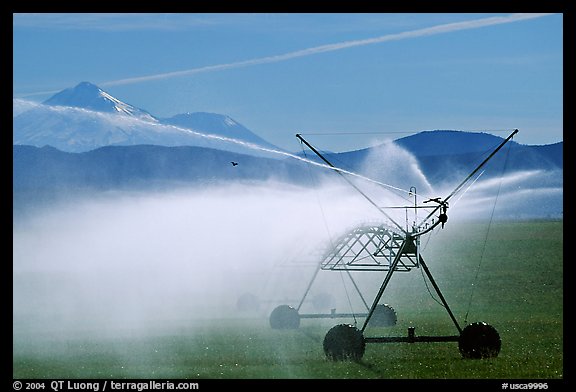 Irrigation machine and Mt Shasta. California, USA (color)