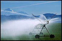 Irrigation machine and Mt Shasta. California, USA